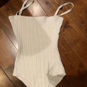 white knit bodysuit from crybaby